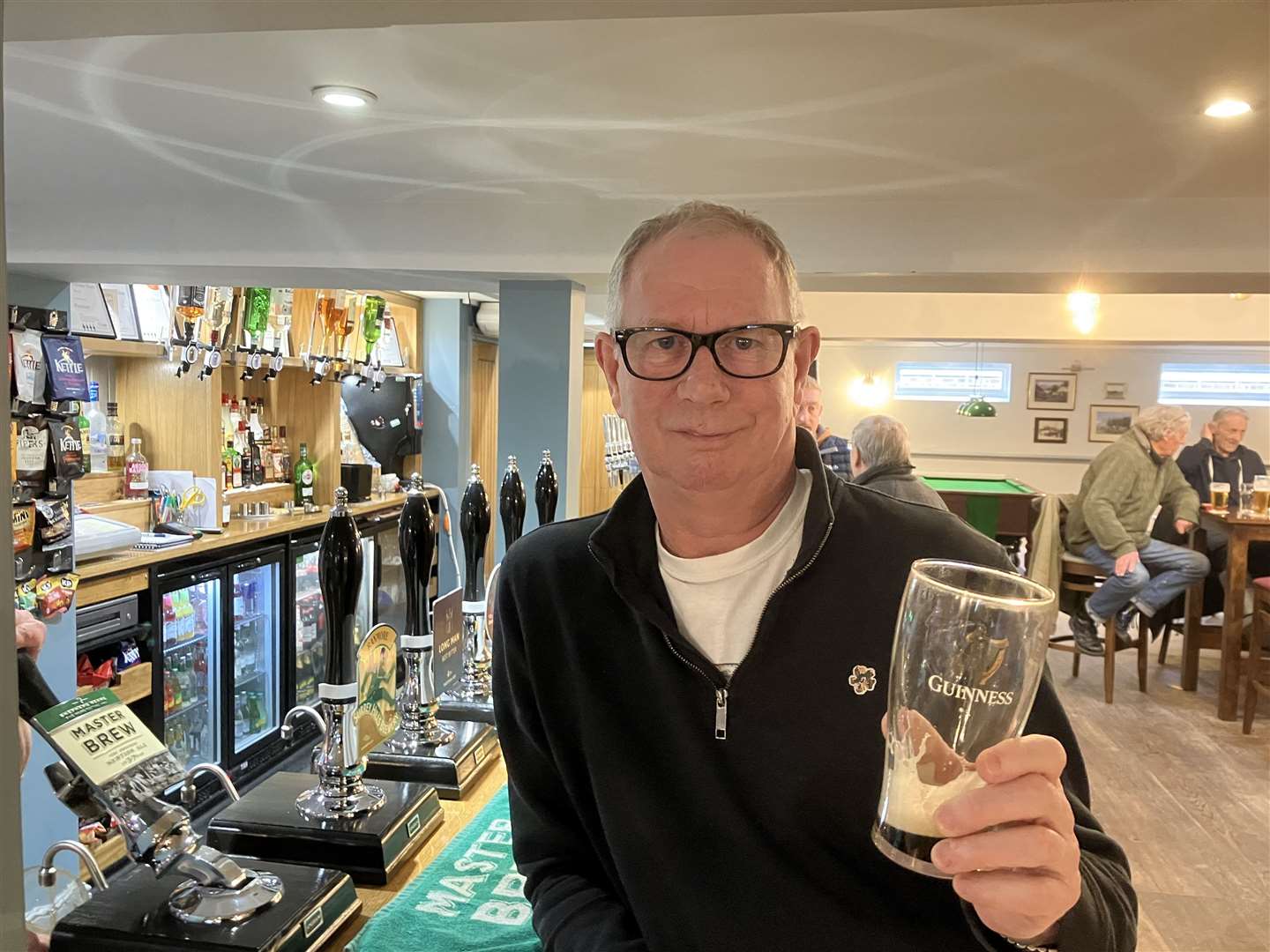 Radio legend John Warnett enjoying a pint at Marden Village Club