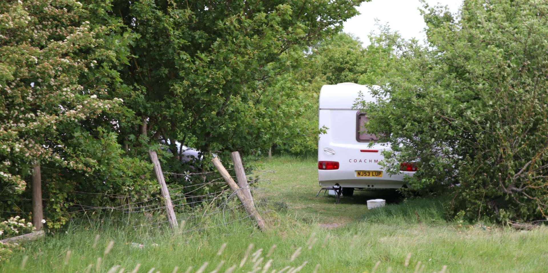 Travellers have broken a fence to access Thistle Hill Community Woodland in Minster