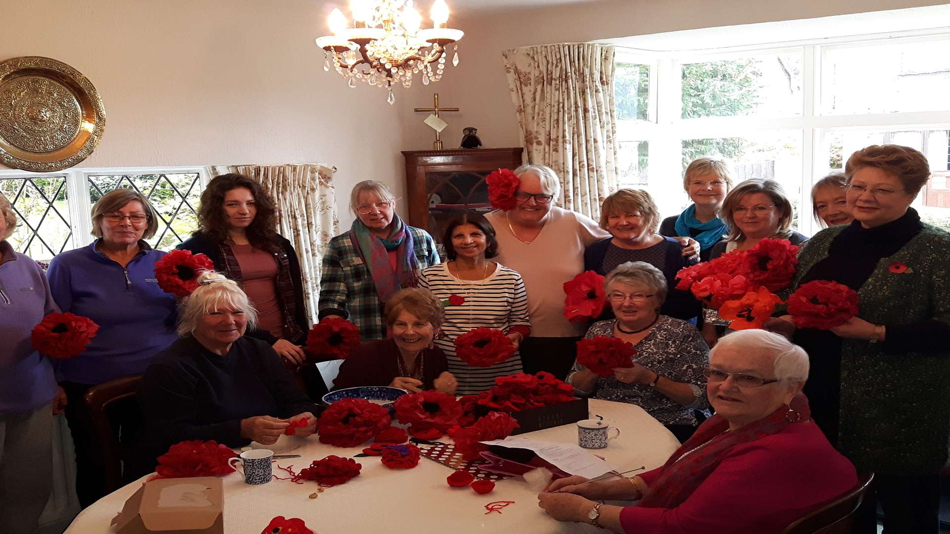 The DVD will show Masheeda Downing and her friends making and sorting through the poppies