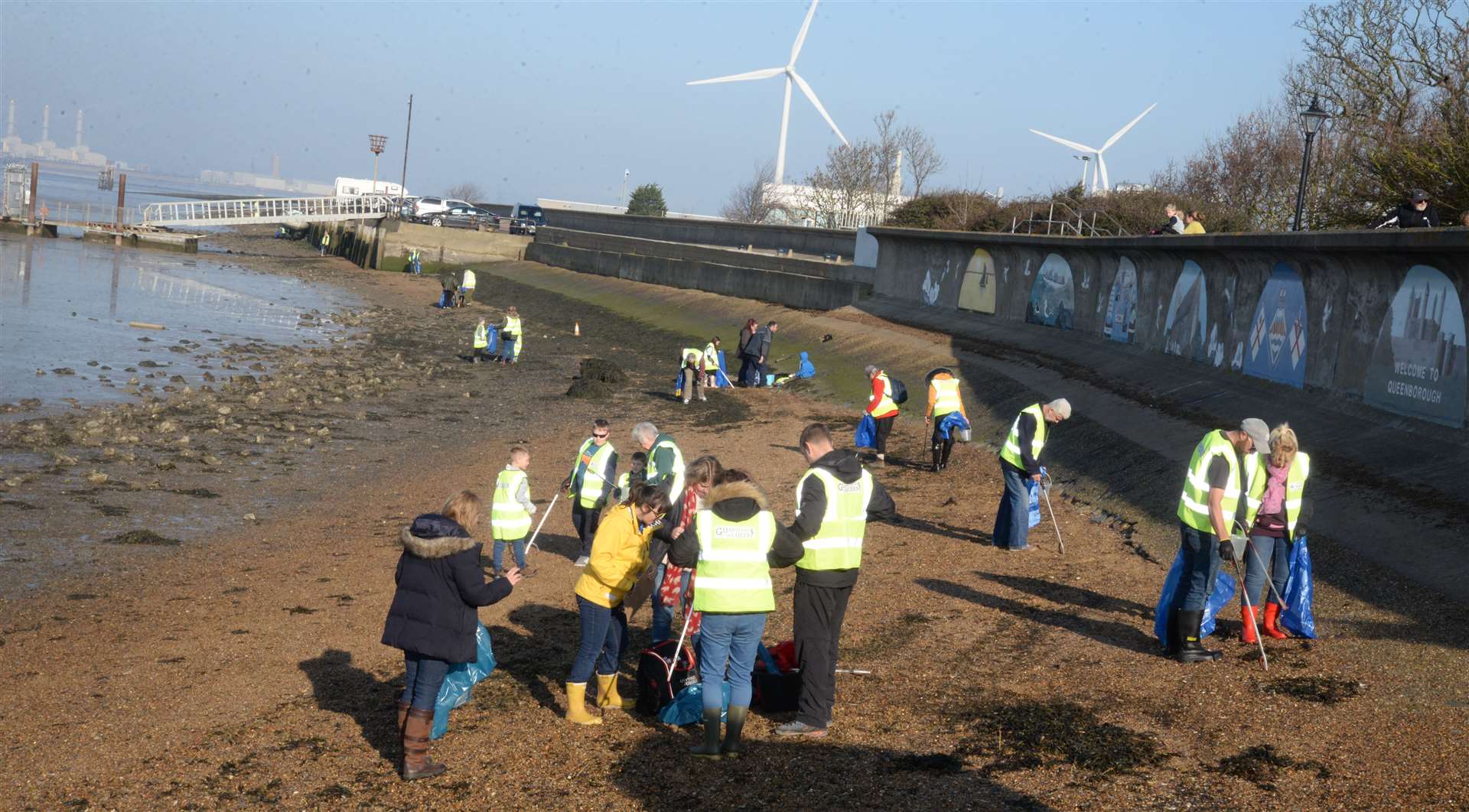 Volunteers get to work during a litter pick on the Queenborough foreshore. Picture: Chris Davey (7702568)