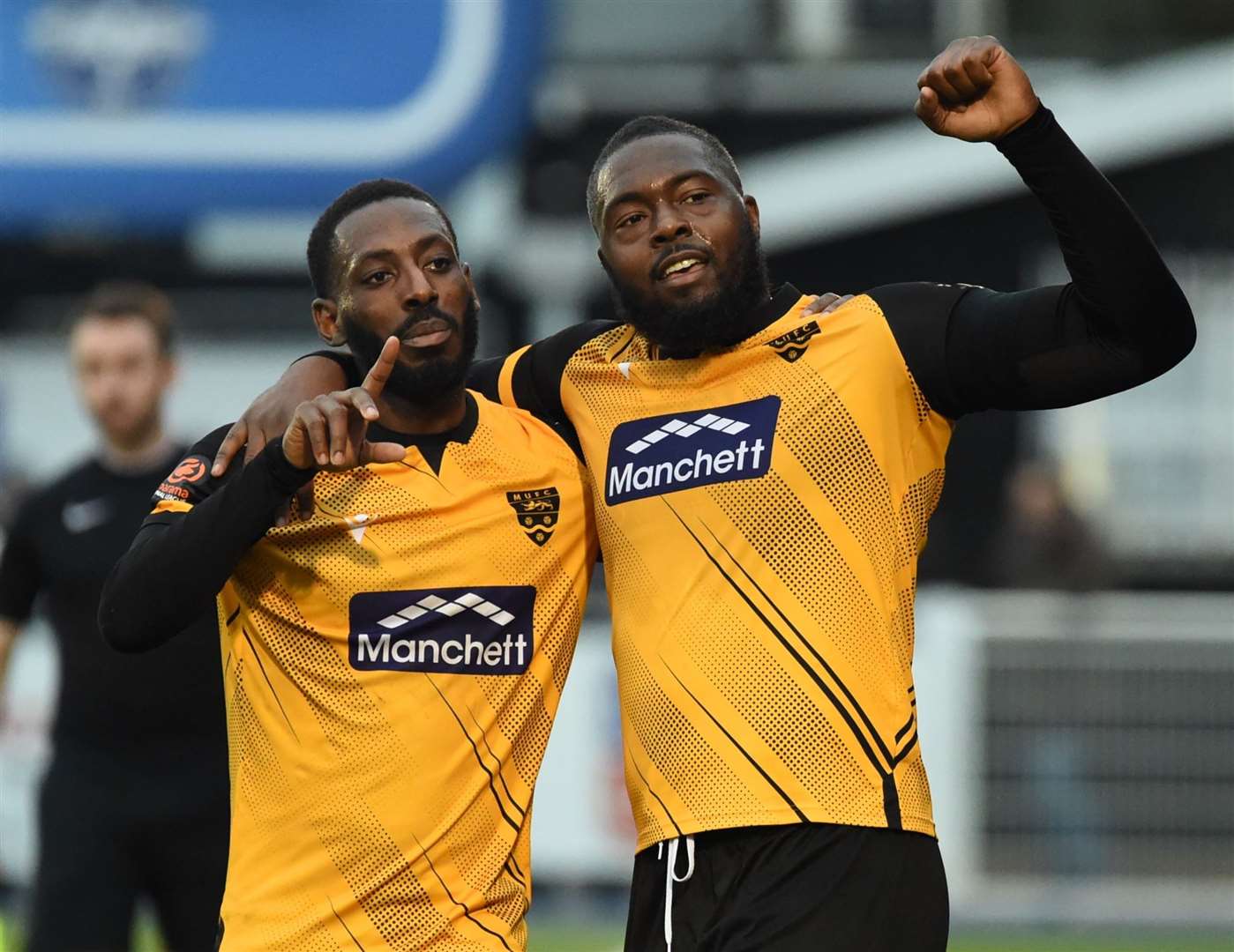 jerome Binnom-Williams, right, celebrates his goal at Eastleigh with Roarie Deacon. Picture: Steve Terrell