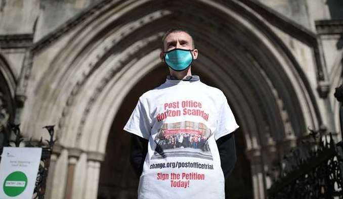 Protesters outside the Royal Courts of Justice Picture: Yui Mok/PA