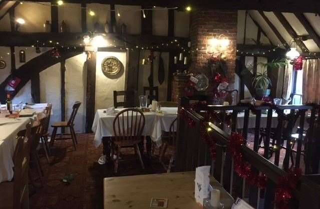 The revellers who’d enjoyed their Christmas lunch had just departed and the barmaid was keen to get the area cleared before the end of her shift