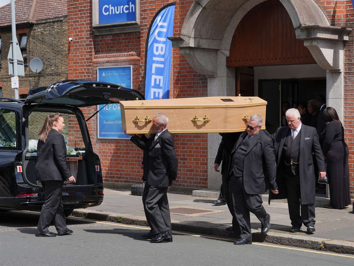 Pallbearers carry the coffin of Daniel Anjorin (Jonathan Brady/PA)