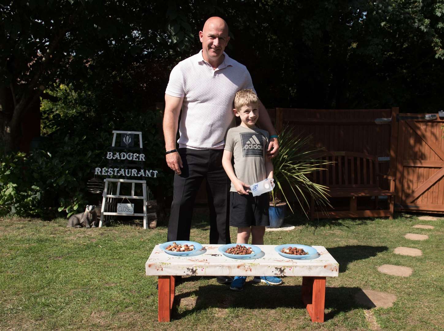 Marcel Payne and his son Lewis run a badger restaurant in their Bearsted garden. Picture: Georgie Gillard/Daily Mail