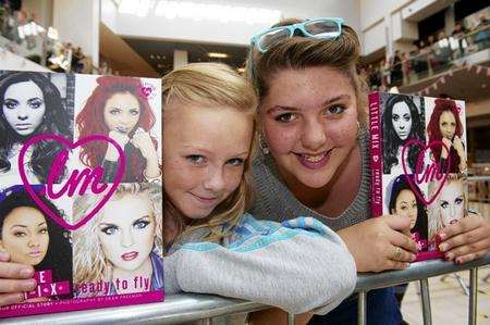 Ellise Myers, left, and Libby Butler, both 12, were the first in the queue for the Little Mix book signing at Bluewater