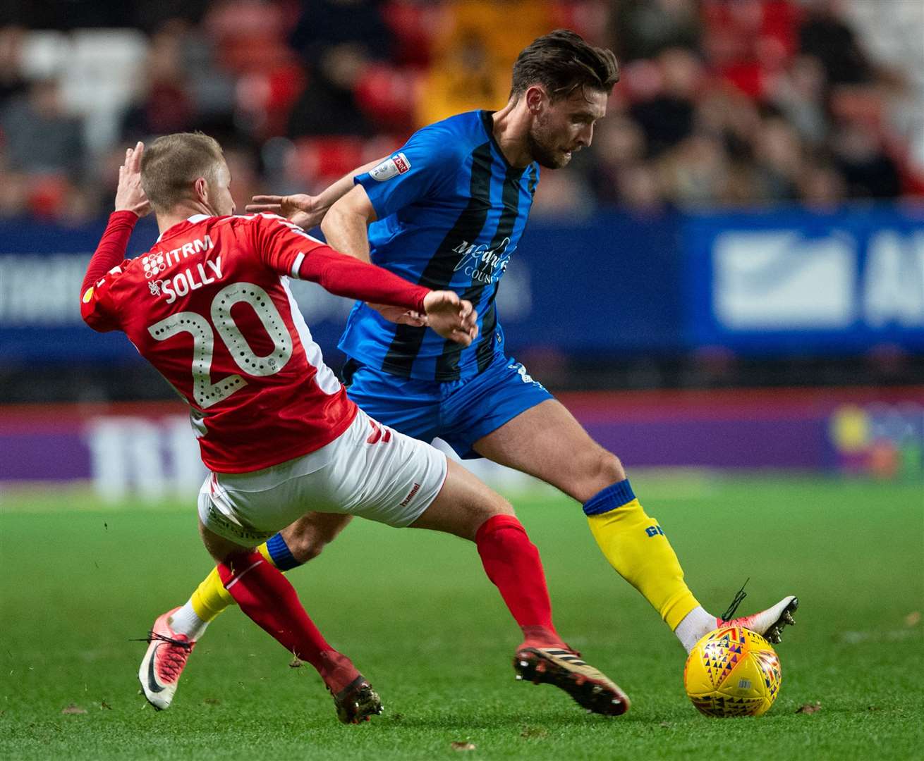 Luke O'Neill of Gillingham is challenged by Charlton's Chris Solly in 2018 - the duo will be team-mates at Ebbsfleet this season. Picture: Ady Kerry