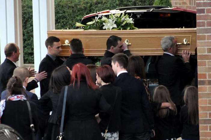 Nick Dean's coffin is carried into Vinters Park Crematorium