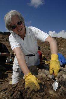 Yvonne Windsor carefully works on the Mausoleum at the Roman site at Ospringe, Faversham.