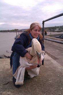 Lorraine St John, of Kent Wildlife Rescue Service, with Smithy the Swan.