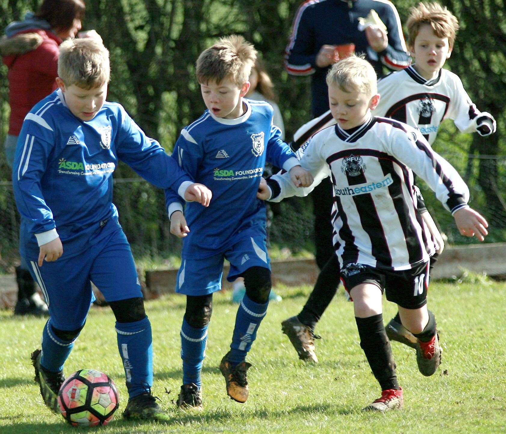 New Road under-9s on the ball against Milton & Fulston United under-9s on Sunday Picture: Phil Lee FM7825347