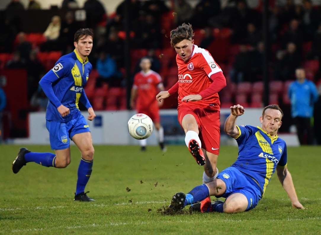 Welling substitute Eli Phipps is thwarted by a last-ditch tackle. Picture: Keith Gillard