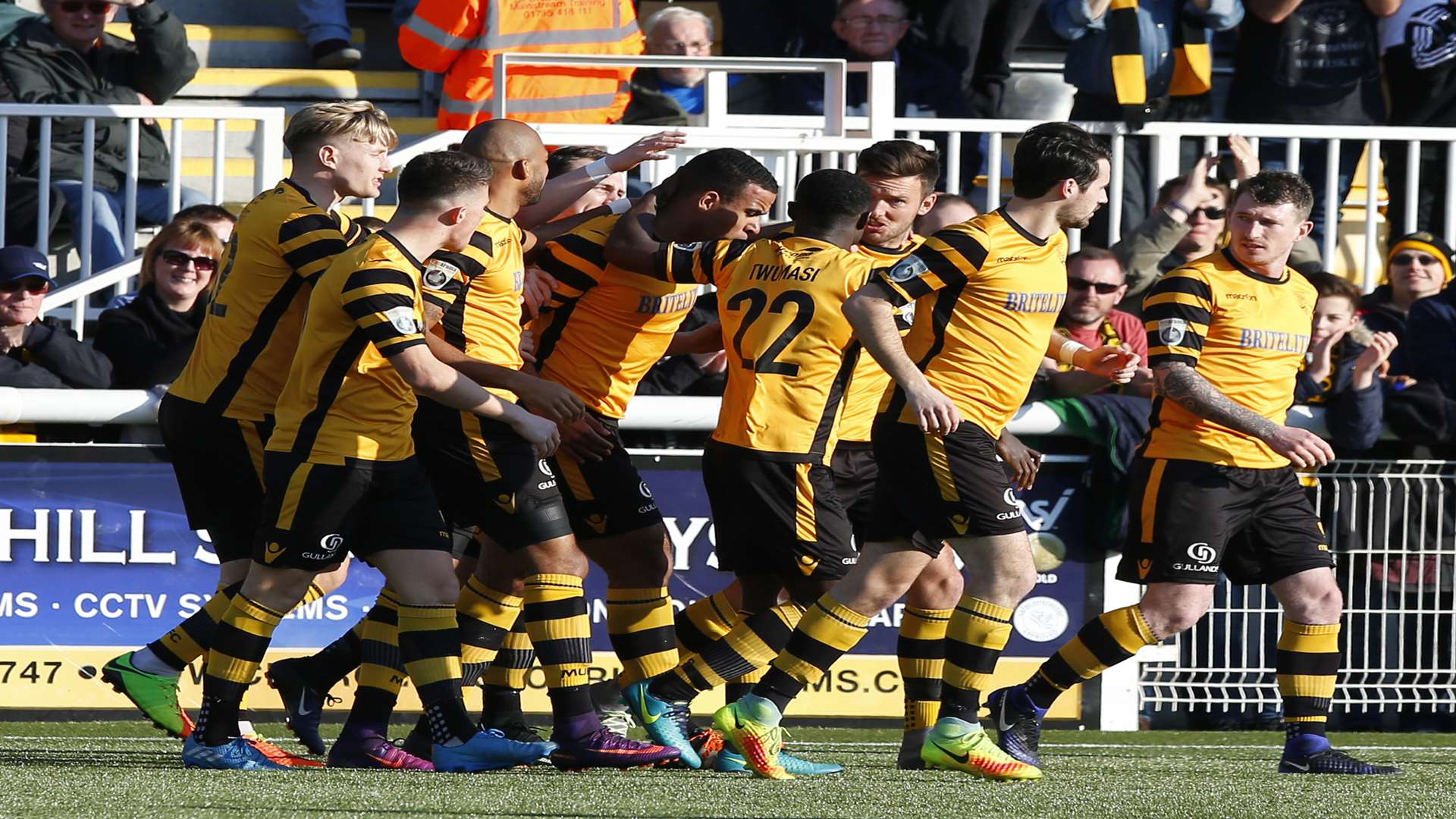 Kevin Lokko, centre, is congratulated by Maidstone team-mates after opening the scoring Picture: Andy Jones