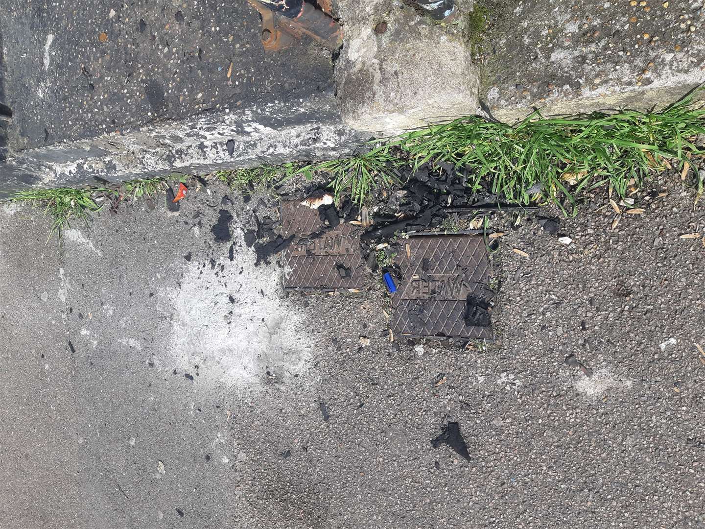 Debris from the blaze remained on the pavement outside the family home in King Street, Gillingham (8146303)