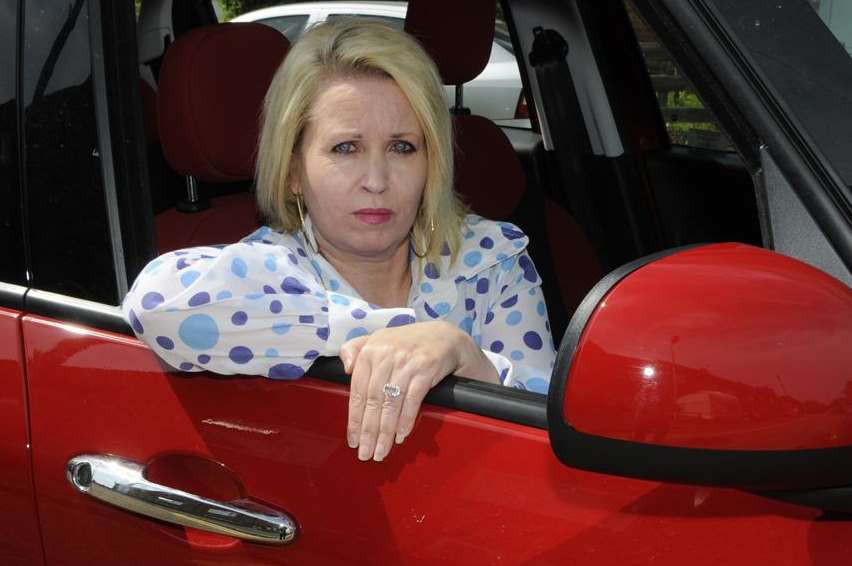 Motorist Tracey Cooper in a courtesy car after her wheel fell off