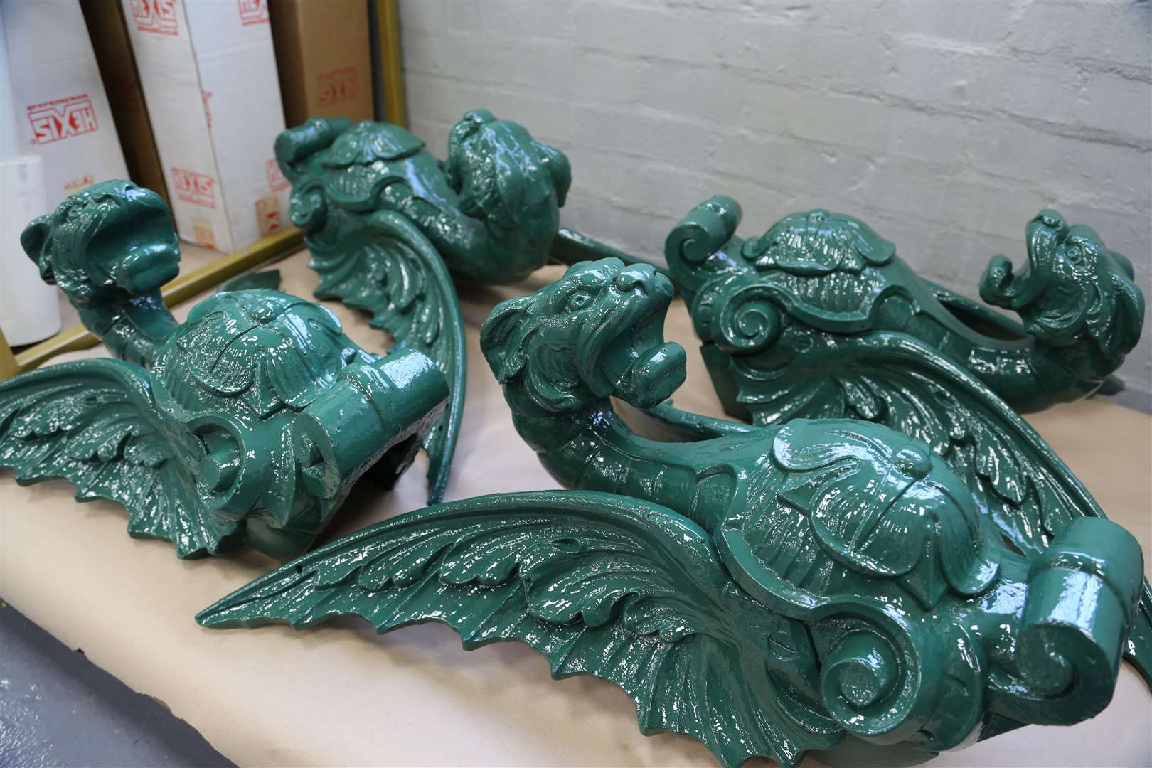 Work in progress on the dragons which go around the top of Sheerness clock tower. Picture: Smith of Derby