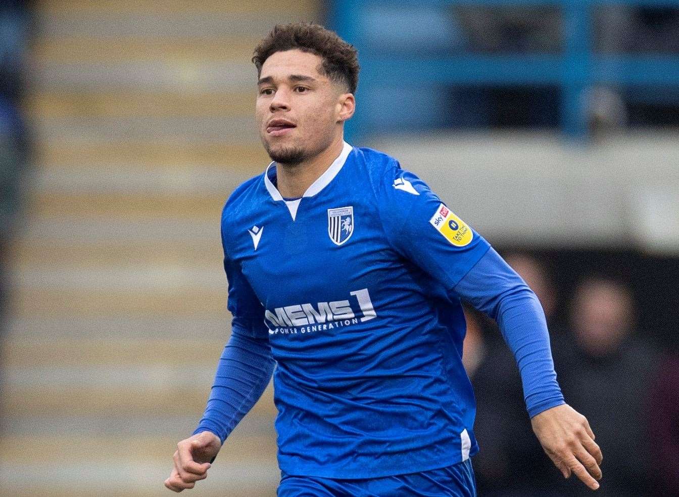 Lewis Walker has left Gillingham to sign a permanent deal at National League side Woking
