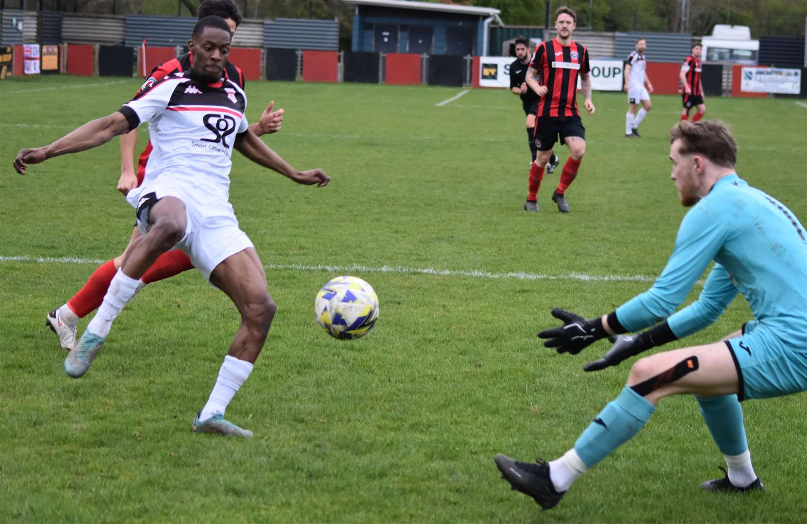 Substitute debutant Darnelle Bailey-King is foiled by Erith Town keeper Mackenzie Foley on Saturday in the Lilywhites’ 3-2 win. Picture: Alan Coomes