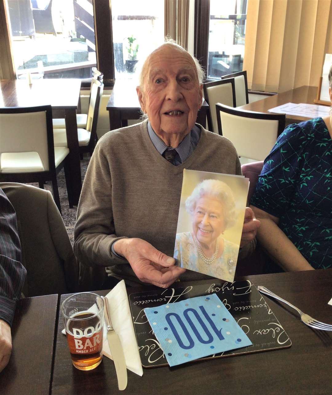 Lenard Warnett celebrates his 100th birthday with a card from the Queen, at the Poult Wood Golf Club in Tonbridge