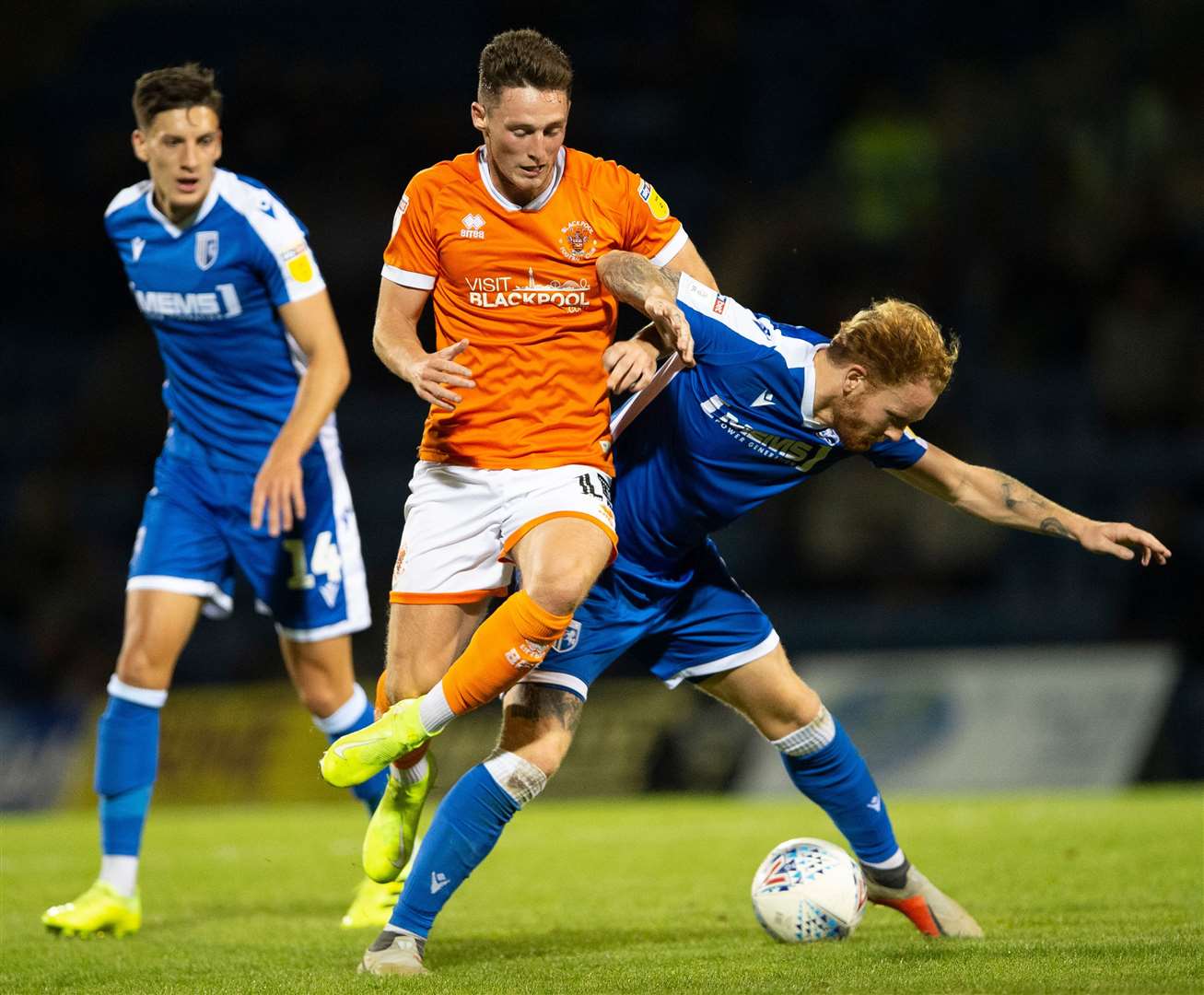 Connor Ogilvie tangles with Blackpool's Jordan Thompson earlier this season Picture: Ady Kerry