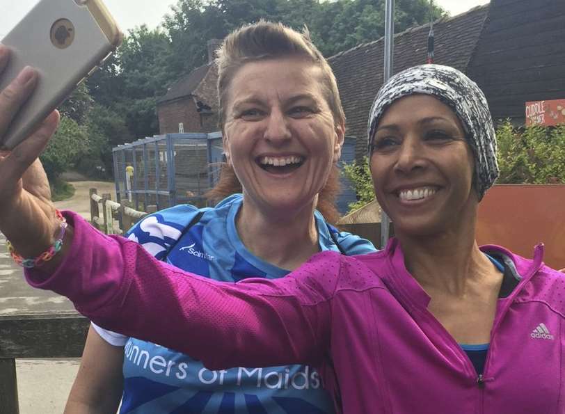 Dame Kelly poses for a selfie with runner Jo Frazer-Wise. Pic: Tom Phillips