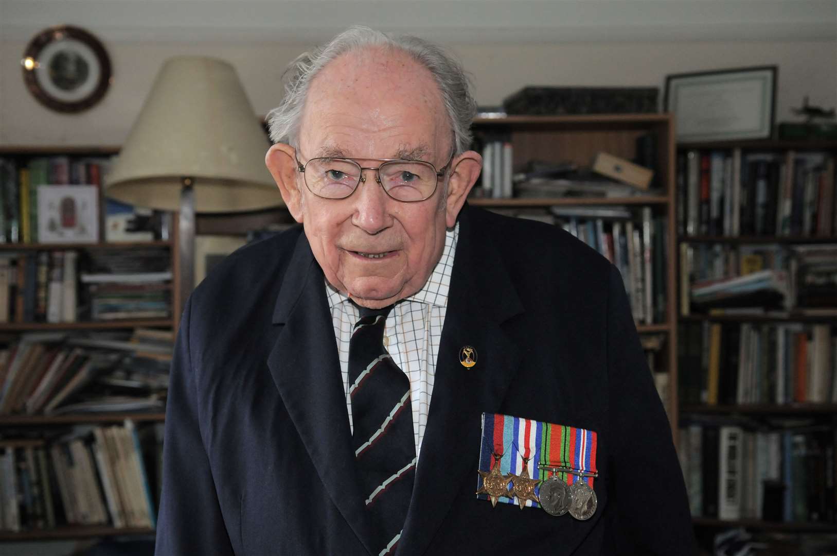 Leslie Nower wearing his war medals in 2015. Picture: Ruth Cuerden for KMG