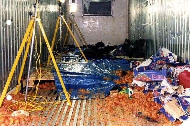 Tomatoes strewn across the trailer of Wacker's lorry, June 2000