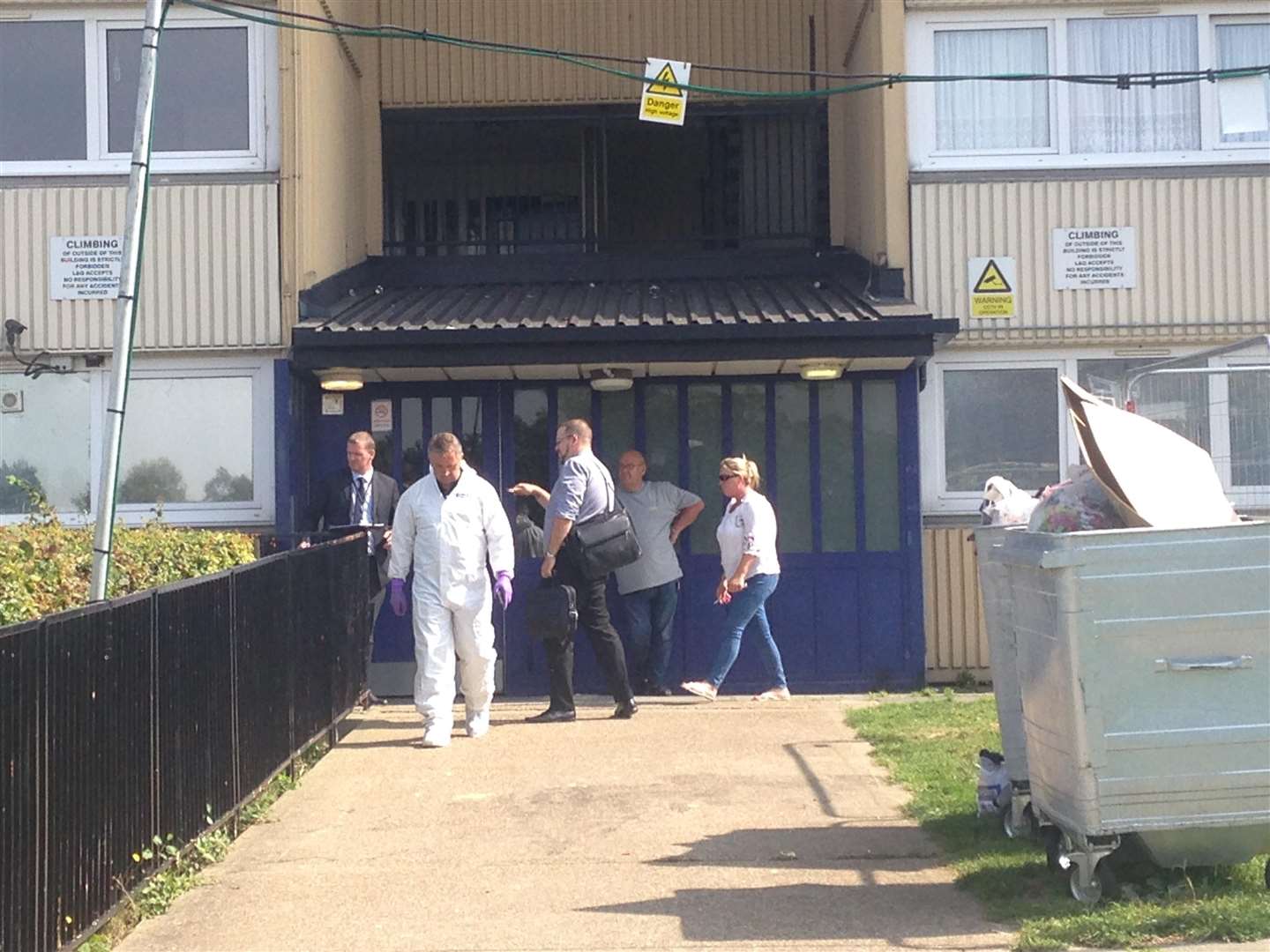 Forensic officers leaving the building in Shipwrights Avenue, Chatham.