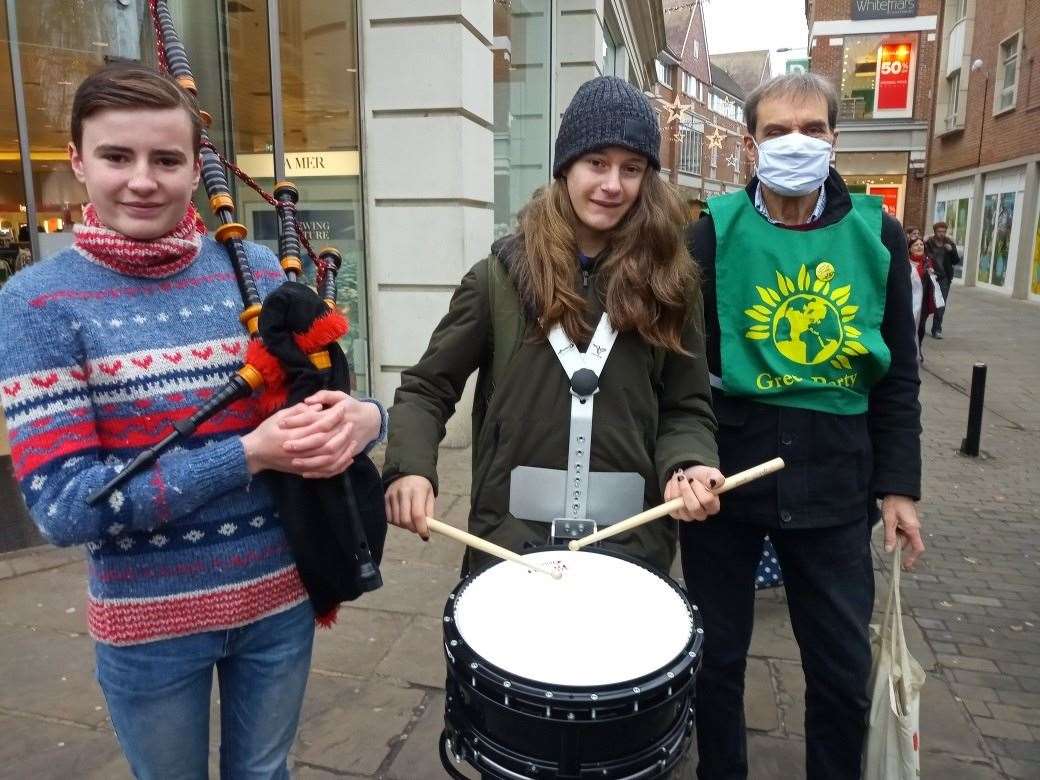 Protestors march in Canterbury city centre today against plans to cut down mature trees in Canterbury high street. Picture: Julie Wassmer