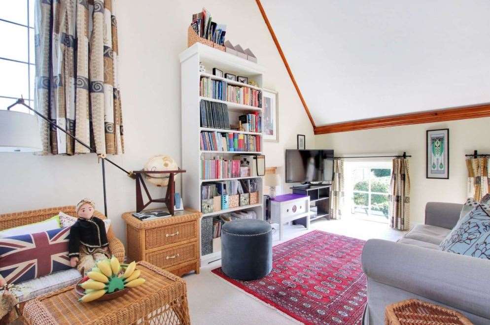 Get away from it all with the property's reception rooms and library. Picture: Savills
