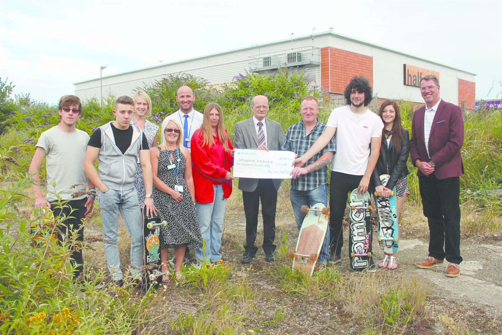 Cllr Mike Whiting (far right) with members of Sittingbourne Skate Park Fundraising Group and representatives from housing association AmicusHorizon, now Optivo