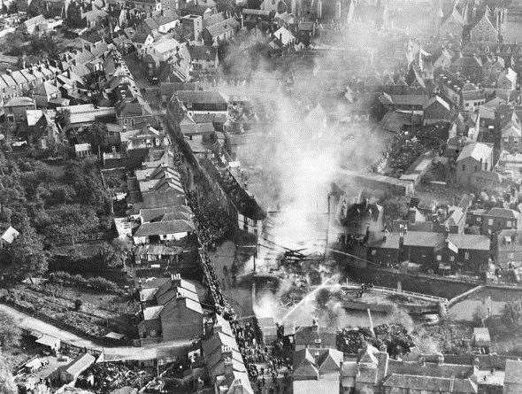 Thhis 1933 aerial photo captures the scene, with the fire at an advanced stage. Note the throng of onlookers in St Radigund’s Street. The Westgate Mill, later known as Hooker’s Mill, succumbed to the same fate in the 1950s.