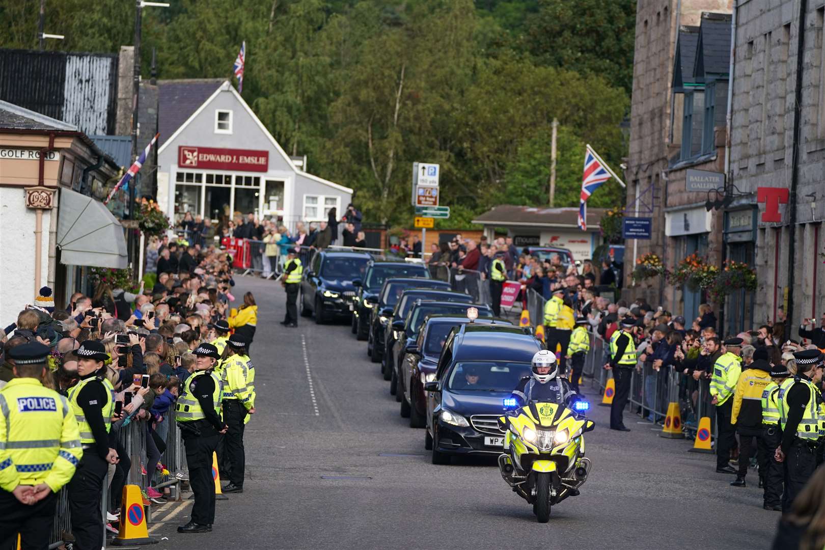 Crowds filled Ballater to pay their respects (Andrew Milligan/PA)