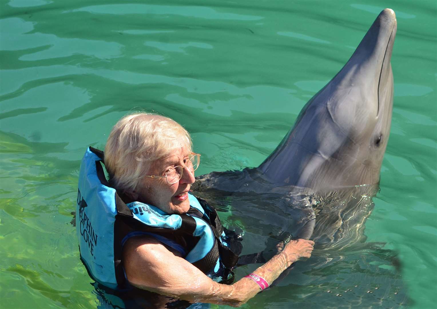 Pauline Polhill swam with dolphins at the age of 90 (Family handout/PA)