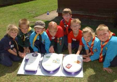 Ella and Jack Williams, Cody Dunn, Jack McDermont, Jack Lewis, Jonah Edwards, Katie Marsh and Daniel Jones with the celebration cake. Picture: DAVE DOWNEY