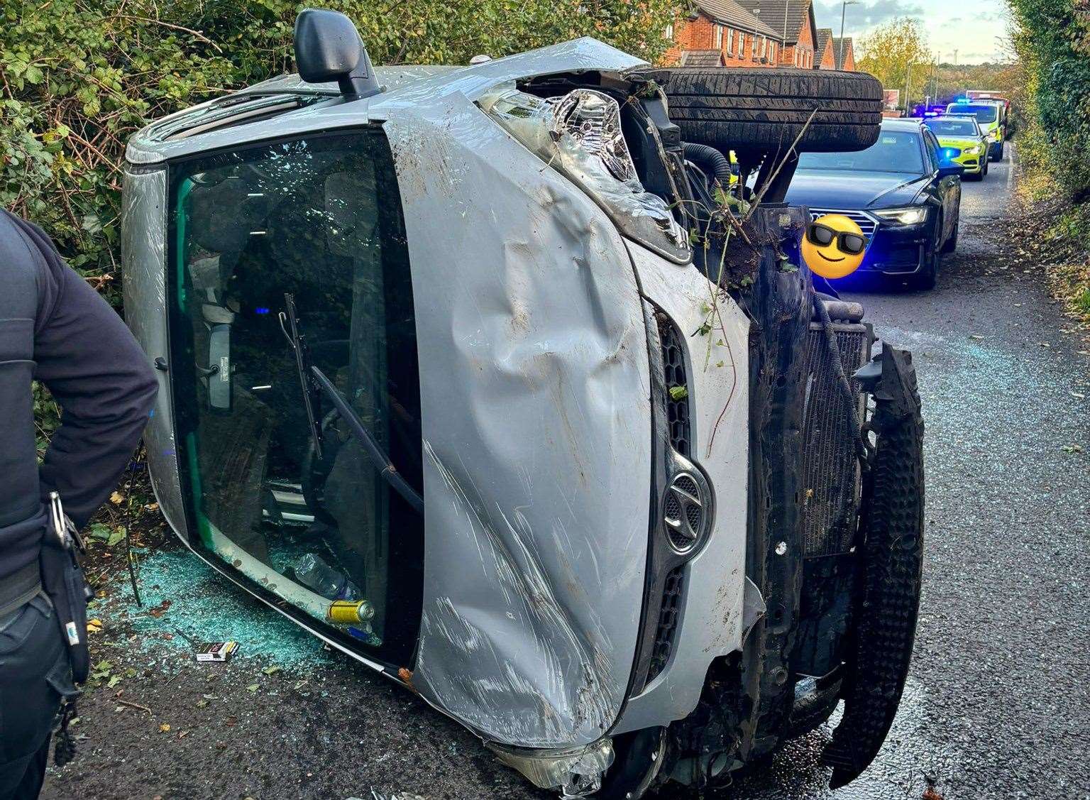 A car was left on its side after being pursued by police in Swanley. Picture @KentPoliceRoads