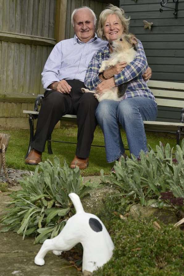 Mike and Chrissie Garner with their dog Buster after his adventure