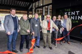 Ex miners join museum staff to cut the ribbon Picture: Tom Webb