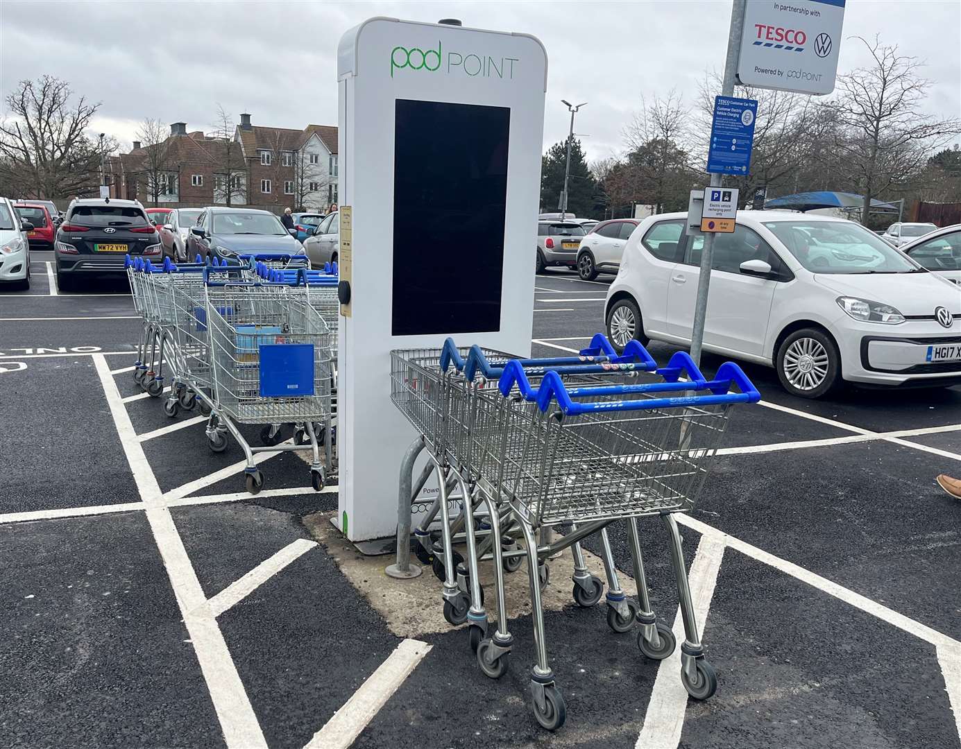 A lack of a trolley bays has left many abandoned at the electric car charging point