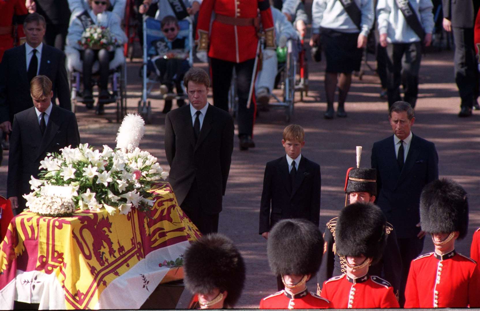 The young duke, second from right, centre, struggled with grieving in public for his mother (Adam Butler/PA)
