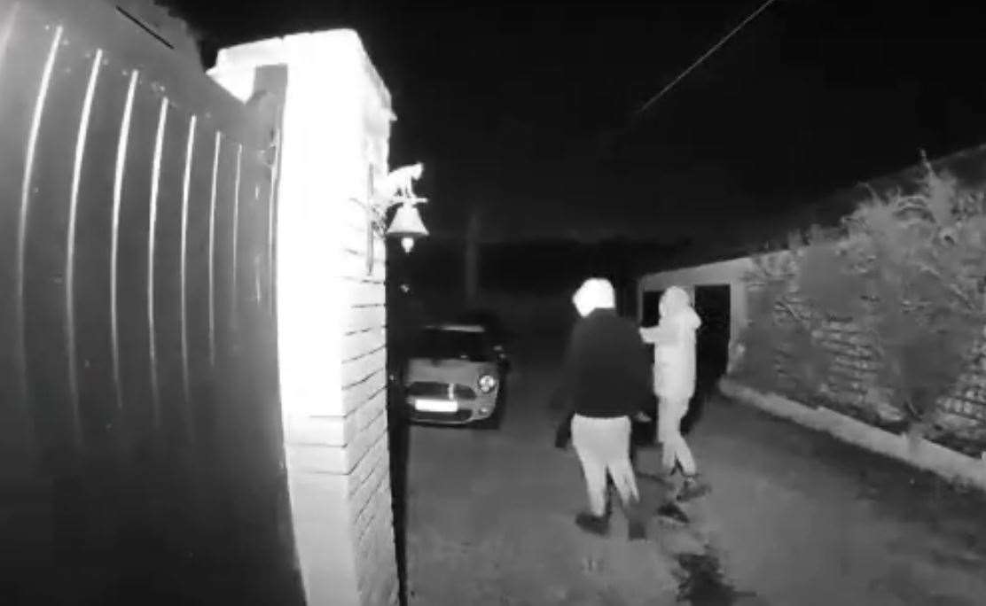 Two men were caught on camera jumping over gates in Fawkham, Longfield, and trying to open people's cars. Picture: Anna Bou