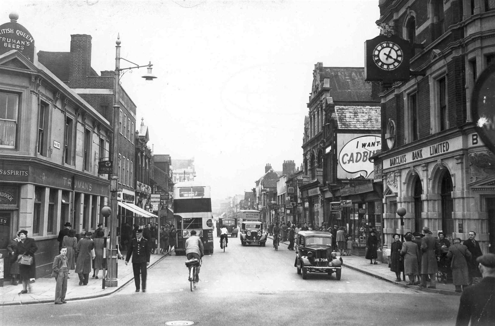 Gillingham High Street in 1951. The British Queen pub on the left is now home to a Betfred, while the Barclays Bank is now occupied by Dockside Property Services
