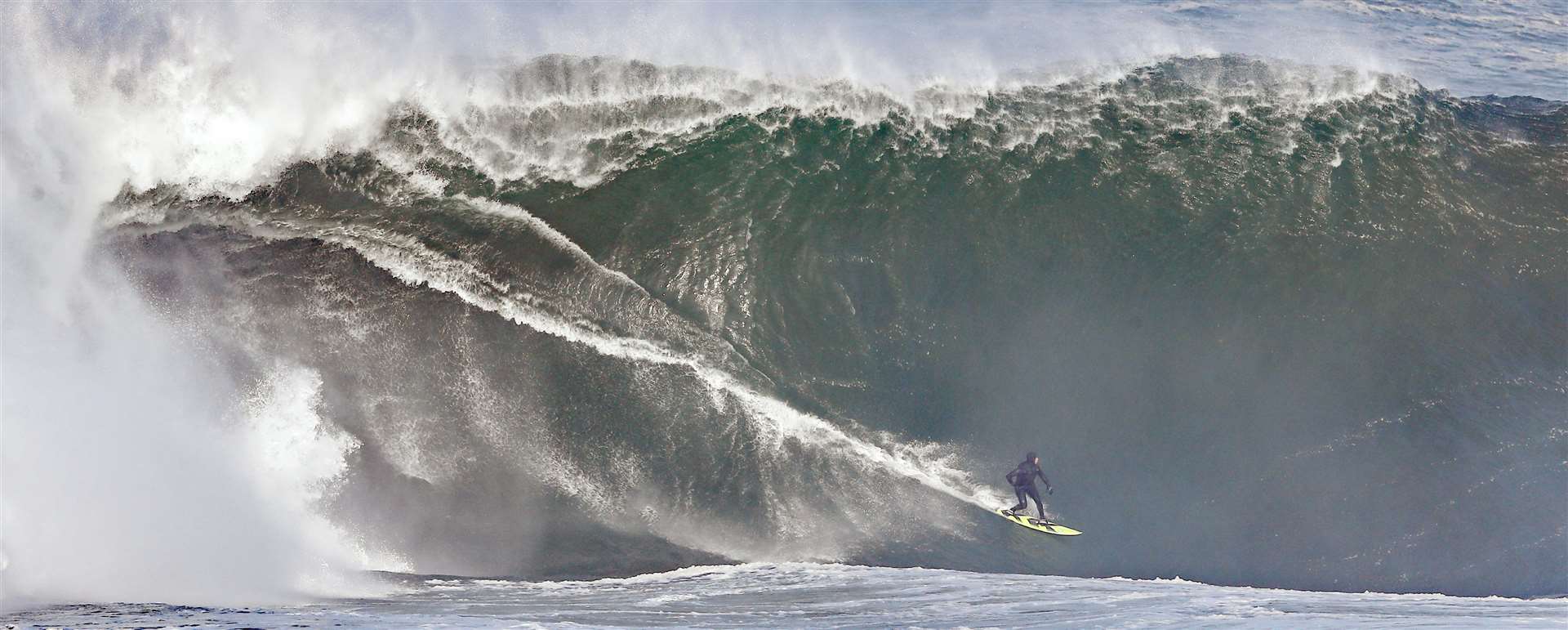 Surfers take to high waves caused by Atlantic swells in Mullaghmore in Co Sligo (Niall Carson/PA).