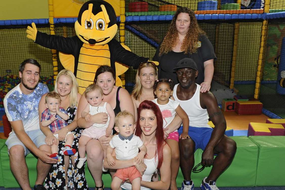 Cute kids competition winners and families and, far right, Bumble Beez play centre manager Tara Wood
