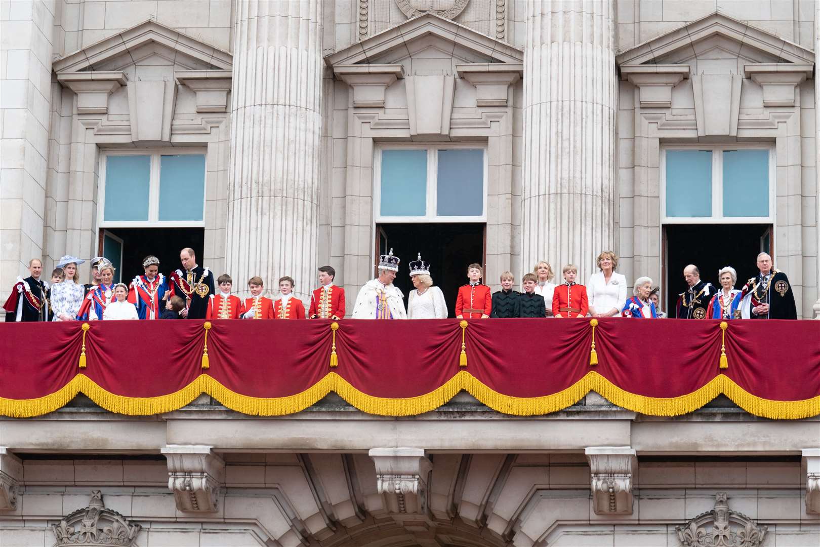 The King and Queen on the Buckingham Palace balcony with family members on Saturday (Stefan Rousseau/PA)