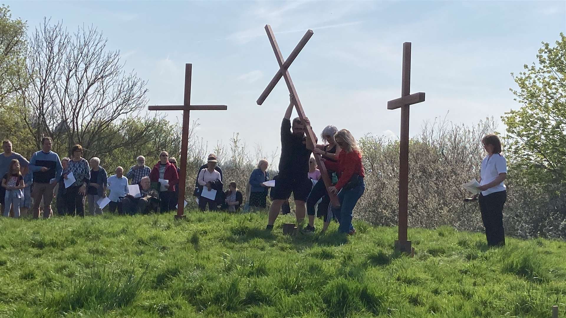 The final cross is put into position
