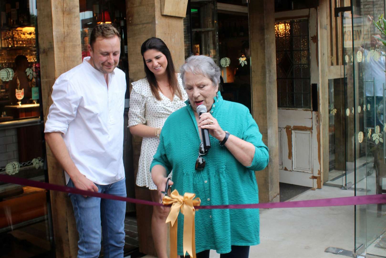 Elham resident Pam Ferris officially opens The Kings Arms with Contemporary Pubs managing director Will Sheldon and his wife Nadine. Picture: The Kings Arms