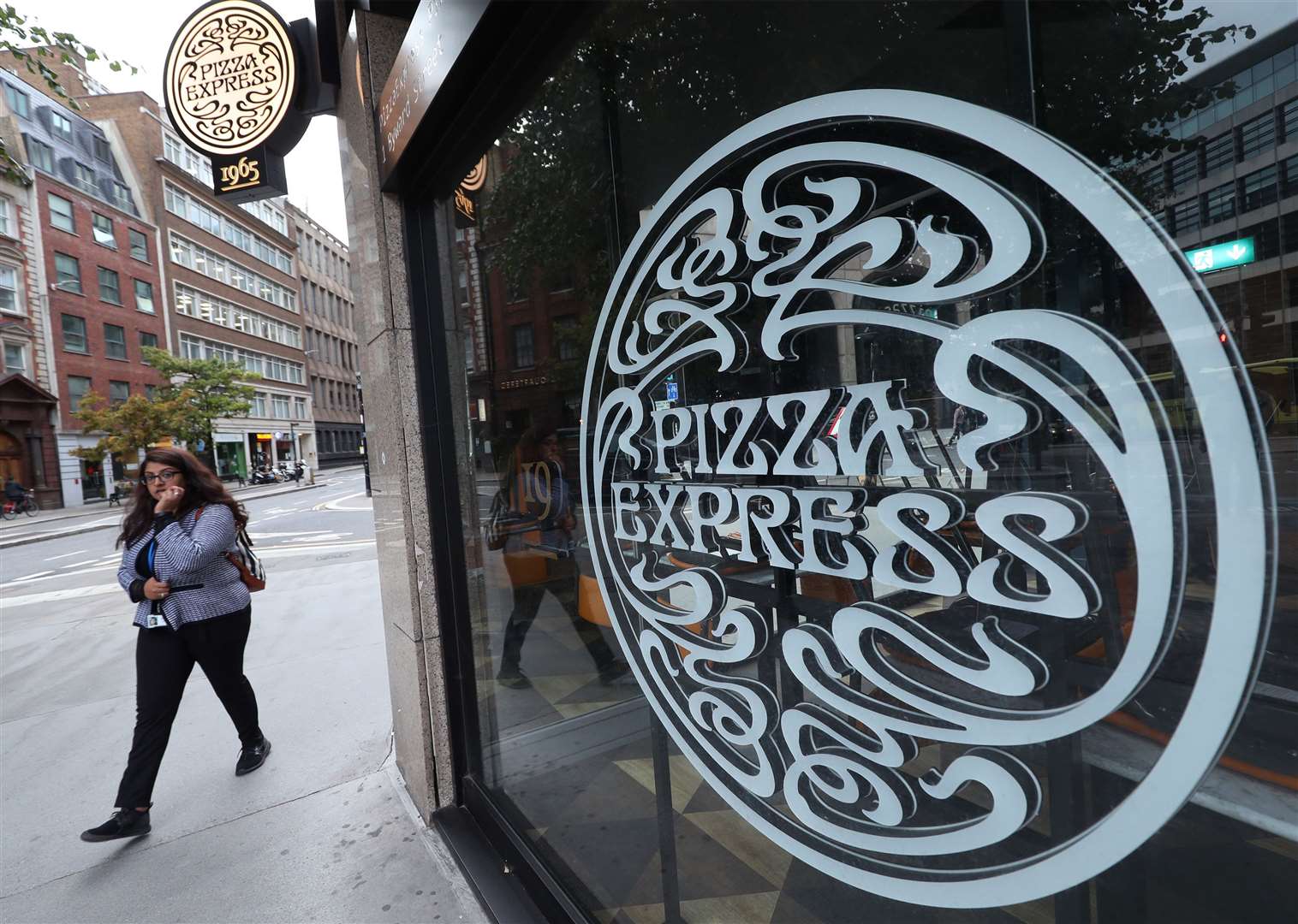 Pizza Express axed more than 2,000 jobs in two separate rounds of cuts in 2020 (Yui Mok/PA)