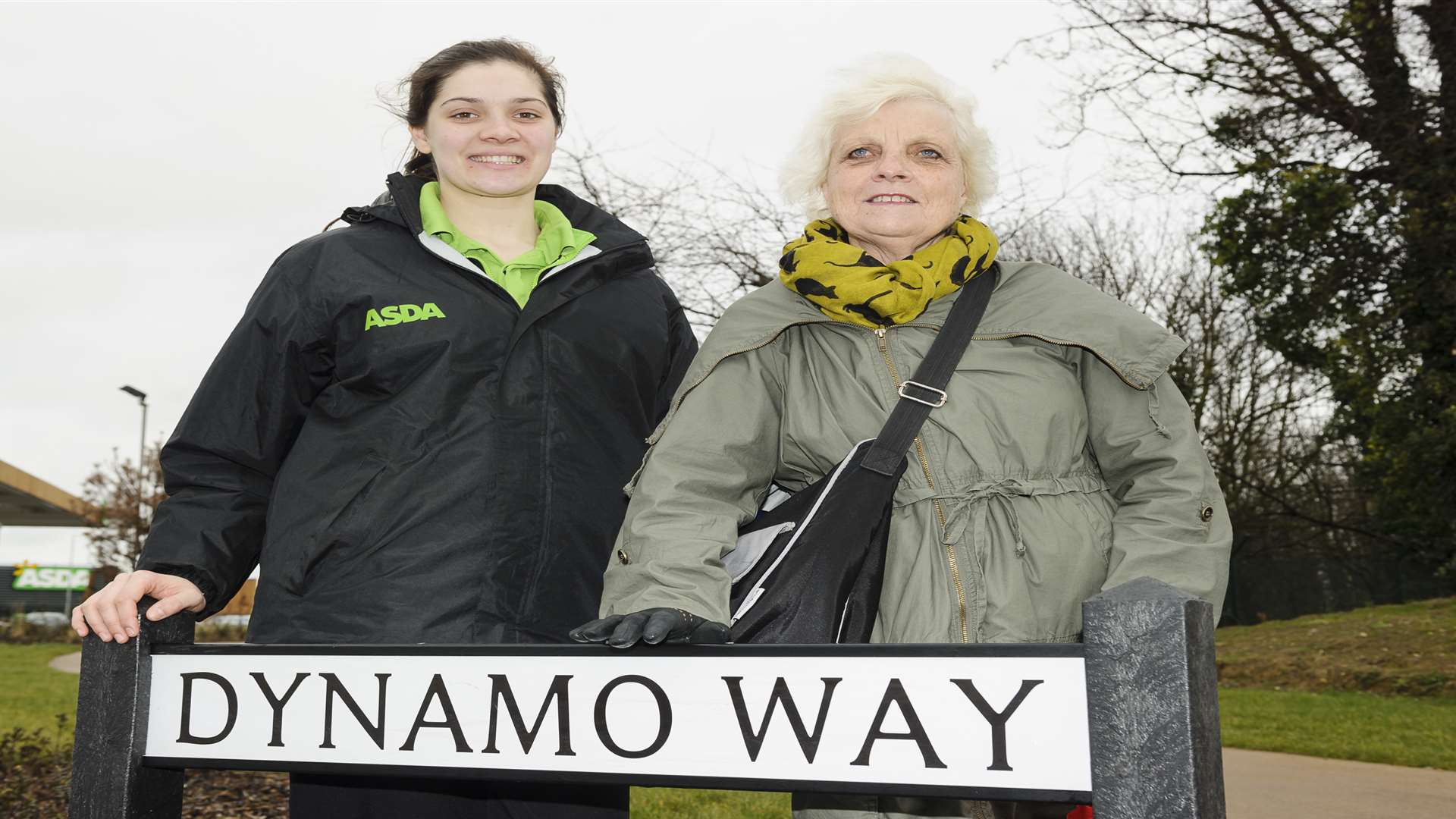 Rosie Smith from asda, and Cllr Pat Cooper at the sign
