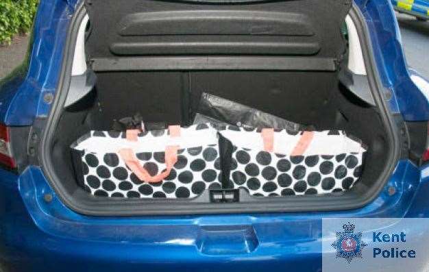 The money was found in two carrier bags in the boot of the car. Photo: Kent Police